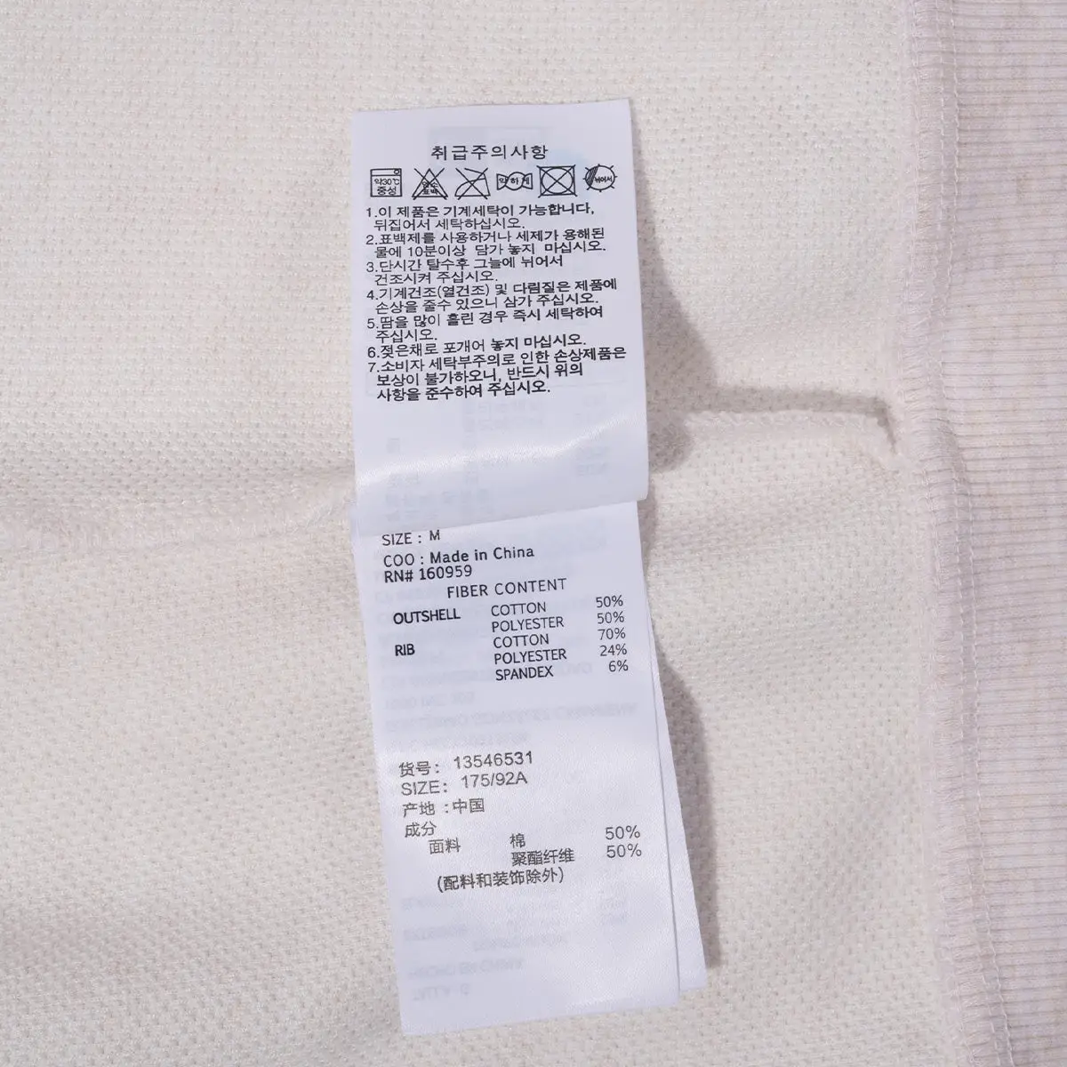 Essentials full zip-up hoodie in beige with front zipper and hood