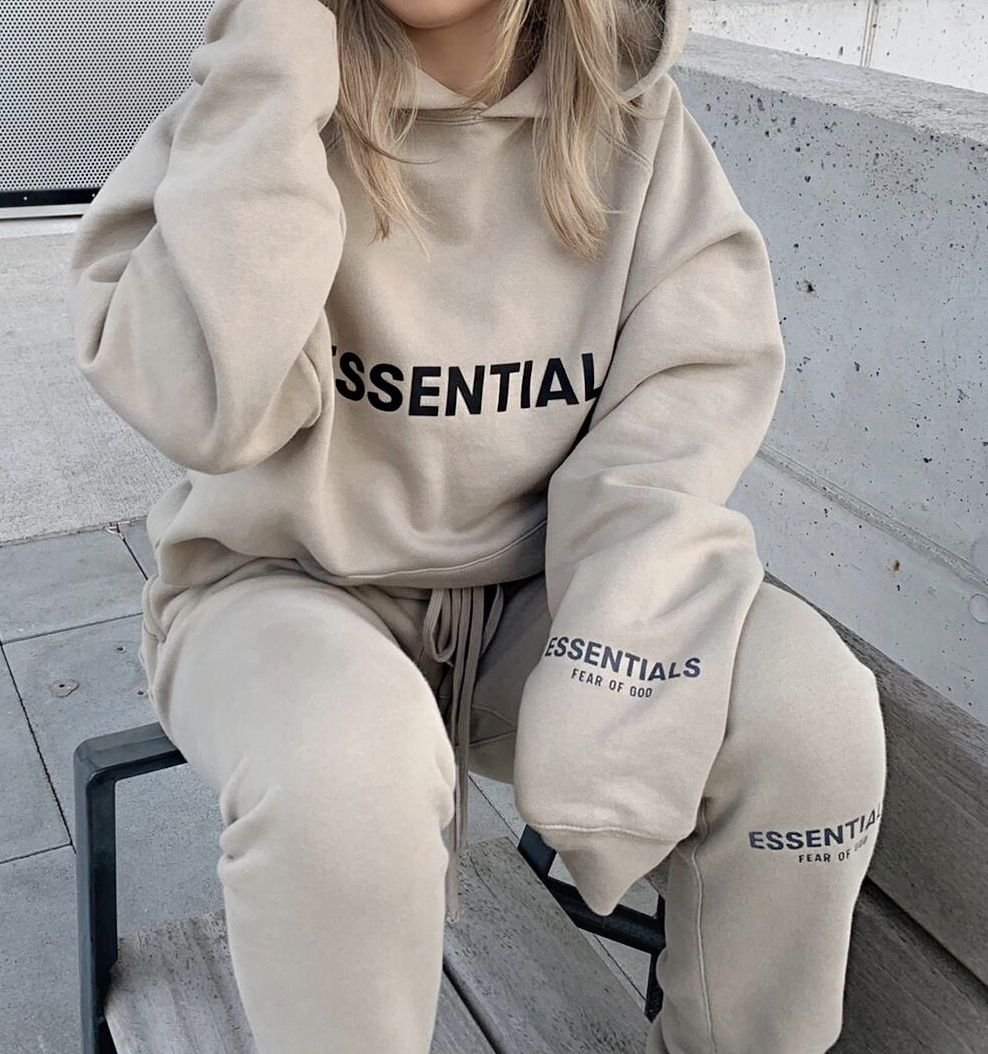 Essential Tracksuit UK taupe worn by woman casual streetwear hoodie
