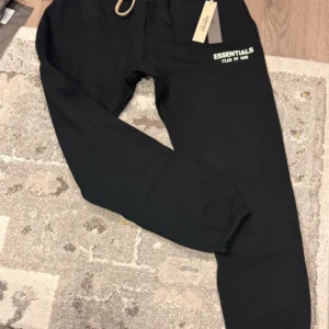 Essentials Fear of God Men’s Black Jogger Trousers with Beige Drawstring and Tapered Fit