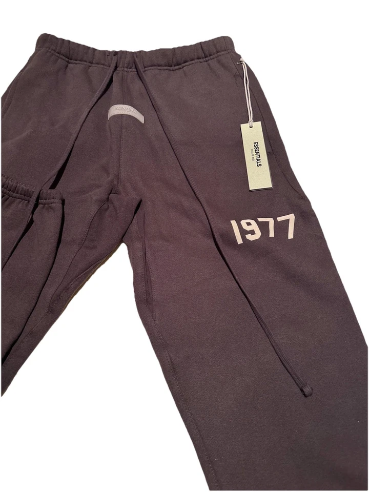 Fear of God Essentials black 1977 tracksuit, oversized streetwear, UK