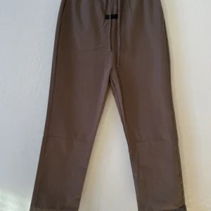 Essentials Fear of God Men's Taupe Jogger Trousers with Beige Drawstring Waistband and Minimalist Branding Tag