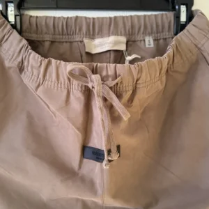 Essentials Fear of God Men’s Taupe Jogger Trousers, featuring Black Essentials Logo and Adjustable Drawstring Waist
